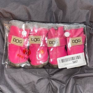 Brand new pink dog shoes.